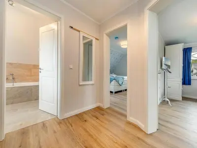 Ein Bett oder Betten in einem Zimmer der Unterkunft Holiday home in Zingst with swimming pool