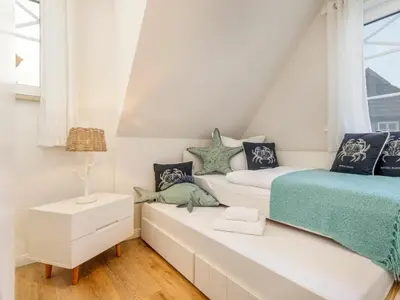 Ein Bett oder Betten in einem Zimmer der Unterkunft Holiday home in Zingst with swimming pool