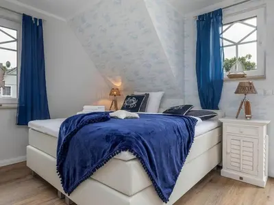 Ein Bett oder Betten in einem Zimmer der Unterkunft Holiday home in Zingst with swimming pool