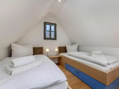Ein Bett oder Betten in einem Zimmer der Unterkunft Holiday home OstseeLust