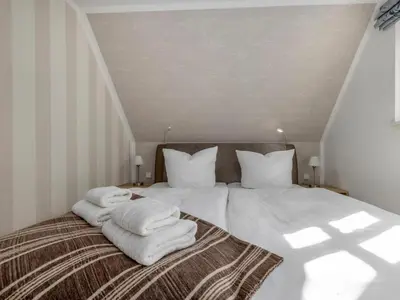 Ein Bett oder Betten in einem Zimmer der Unterkunft Holiday home OstseeLust