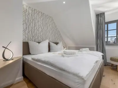 Ein Bett oder Betten in einem Zimmer der Unterkunft Holiday home OstseeLust