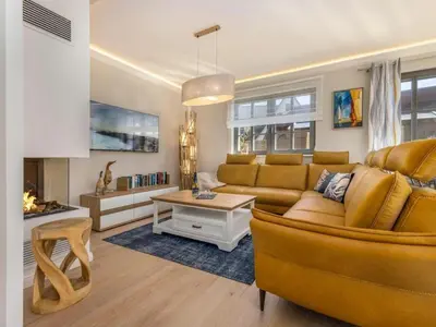 Ein Sitzbereich in der Unterkunft Holiday home OstseeLust