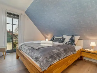 Ein Bett oder Betten in einem Zimmer der Unterkunft Poppy - House Summer Meadow