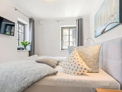 Ein Bett oder Betten in einem Zimmer der Unterkunft Holiday apartment with 2 bedrooms
