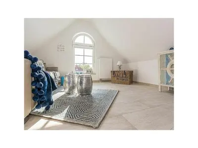 Ein Sitzbereich in der Unterkunft Baltic Sea House Seagrass Fireplace