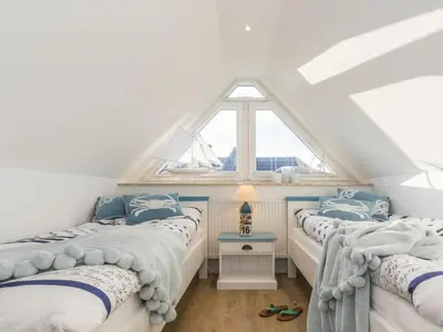 Ein Bett oder Betten in einem Zimmer der Unterkunft Holiday home in Zingst with swimming pool
