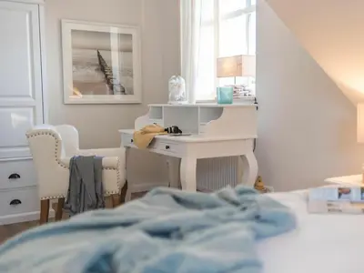 Ein Bett oder Betten in einem Zimmer der Unterkunft Holiday home in Zingst with swimming pool