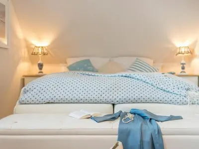 Ein Bett oder Betten in einem Zimmer der Unterkunft Holiday home in Zingst with swimming pool