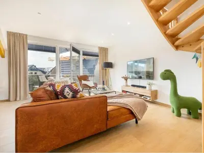 Ein Sitzbereich in der Unterkunft One-bedroom apartment