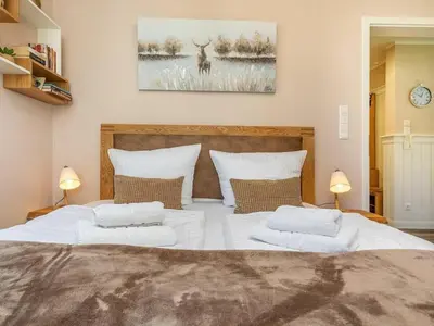 Ein Bett oder Betten in einem Zimmer der Unterkunft Suite Windböe - Holiday Resort Strandwiese