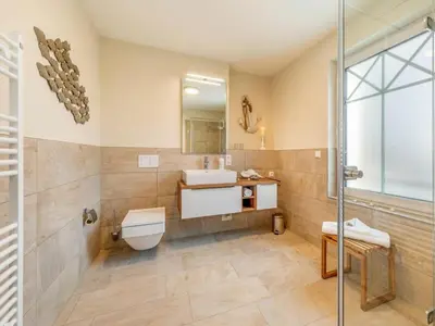 Ein Badezimmer in der Unterkunft Suite 6 Windkieker