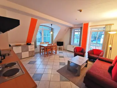 Ein Sitzbereich in der Unterkunft UNSERE GEMÜTLICHE PERLE MIT BALKON im Bernsteinhaus Zingst - 5 -