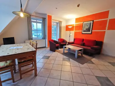 Ein Sitzbereich in der Unterkunft UNSERE GEMÜTLICHE PERLE MIT BALKON im Bernsteinhaus Zingst - 5 -