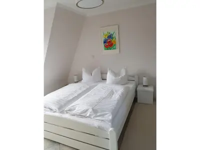 Ein Bett oder Betten in einem Zimmer der Unterkunft Holiday apartment with 1 bedroom