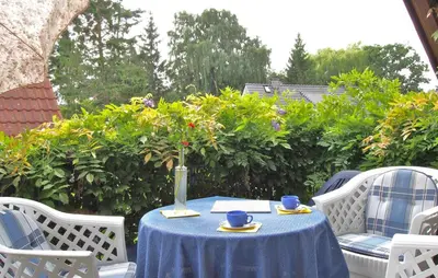 Ein Garten an der Unterkunft Birkmaase 16 - Komfort FeWo im 4-Sterne-Ferienhaus Manuela DG