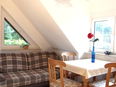Ein Sitzbereich in der Unterkunft Birkmaase 16 - Komfort FeWo im 4-Sterne-Ferienhaus Manuela DG