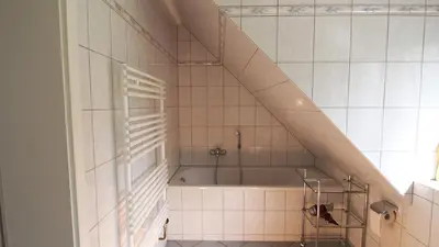 Ein Badezimmer in der Unterkunft Birkmaase 18 - Komfort FeWo im 4-Sterne-Ferienhaus Yvonne DG
