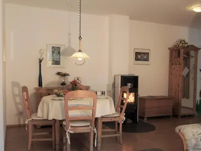 Ein Sitzbereich in der Unterkunft Birkmaase 12 - Kapitänshaus Jacqueline 4-Sterne Komfort FeWo im EG links
