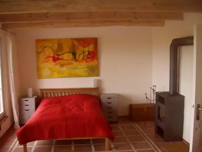 Ein Bett oder Betten in einem Zimmer der Unterkunft Hofboddenblick
