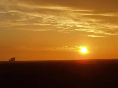 Blick auf den Sonnenuntergang/Sonnenaufgang von der Ferienwohnung aus oder aus der Nähe