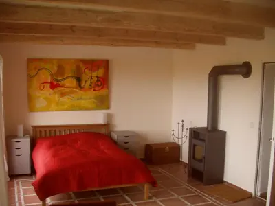 Ein Bett oder Betten in einem Zimmer der Unterkunft Hofboddenblick