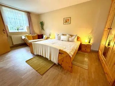 Ein Bett oder Betten in einem Zimmer der Unterkunft BAUERNHAUS KRULL App 03