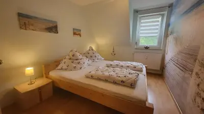 Ein Bett oder Betten in einem Zimmer der Unterkunft Ferienwohnung Böttcher