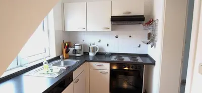 Küche/Küchenzeile in der Unterkunft Birkmaase 14 - Komfort FeWo im 4-Sterne-Ferienhaus Anselm DG