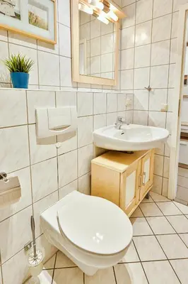 Ein Badezimmer in der Unterkunft Haus Kranich 3, Fewo Nr 11