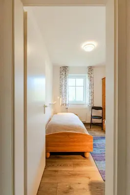 Ein Bett oder Betten in einem Zimmer der Unterkunft Haus Boddenperle Fewo Nr 4