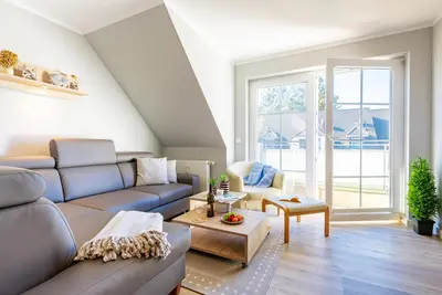 Ein Sitzbereich in der Unterkunft Ferienwohnung Nr 6