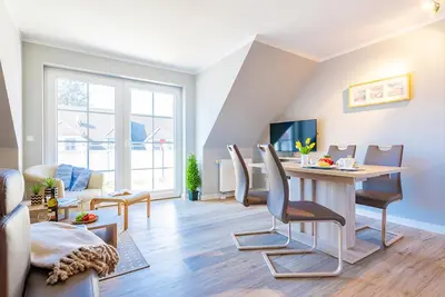 Ein Sitzbereich in der Unterkunft Ferienwohnung Nr 6