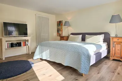 Ein Bett oder Betten in einem Zimmer der Unterkunft Ferienwohnung im Haus Kavelhus