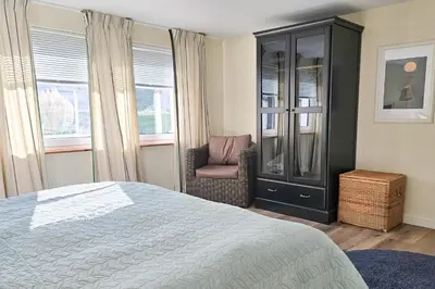 Ein Bett oder Betten in einem Zimmer der Unterkunft Ferienwohnung im Haus Kavelhus