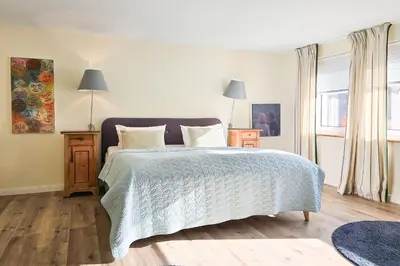 Ein Bett oder Betten in einem Zimmer der Unterkunft Ferienwohnung im Haus Kavelhus