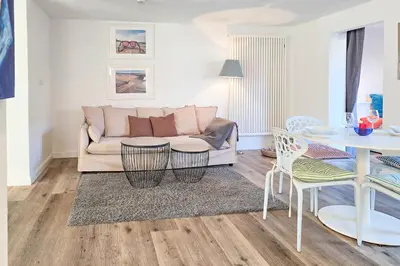 Ein Sitzbereich in der Unterkunft Ferienwohnung im Haus Kavelhus