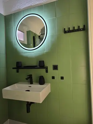 Ein Badezimmer in der Unterkunft Appartment Zweierlei