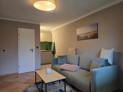 Ein Sitzbereich in der Unterkunft Appartment Zweierlei