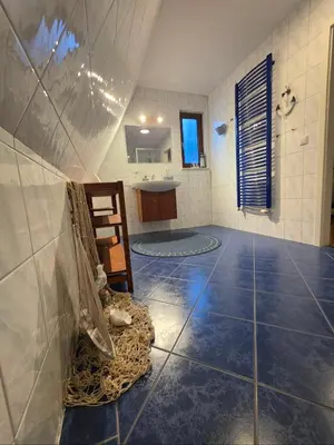 Ein Badezimmer in der Unterkunft Atelierwohnung eines Fischers