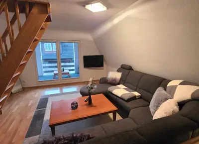 Ein Sitzbereich in der Unterkunft Atelierwohnung eines Fischers