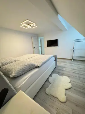 Ein Bett oder Betten in einem Zimmer der Unterkunft Apartament Bors