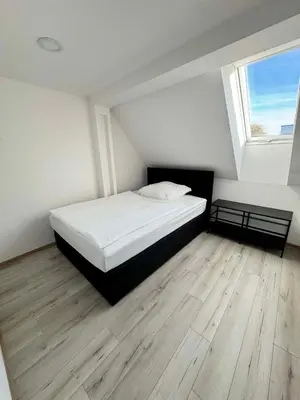 Ein Bett oder Betten in einem Zimmer der Unterkunft Apartament Bors