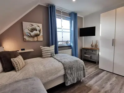 Ein Bett oder Betten in einem Zimmer der Unterkunft Kaveleck