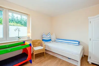 Ein Bett oder Betten in einem Zimmer der Unterkunft Ferienwohnung Hann