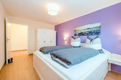 Ein Bett oder Betten in einem Zimmer der Unterkunft Ferienwohnung Hann
