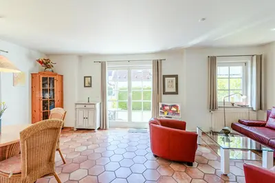 Ein Sitzbereich in der Unterkunft Haus Kormoran, Fewo Nr 12