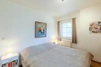 Ein Bett oder Betten in einem Zimmer der Unterkunft Haus Kormoran, Fewo Nr 12
