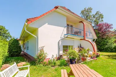 Ein Garten an der Unterkunft Windjammer 1, Whg 5