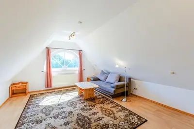 Ein Sitzbereich in der Unterkunft Haus Kormoran, Fewo Nr 8
